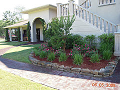  Landscaping Project - Rock enclosed mulch bed 